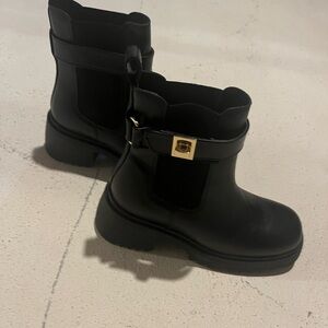 Steve Madden Black Ankle Boots with Gold Accent